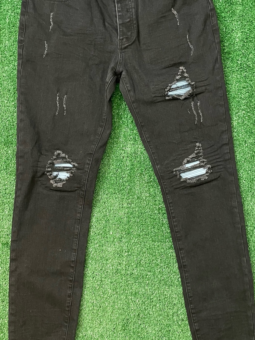 AMIRI Black Ripped Skinny Jeans with Blue Underlayer